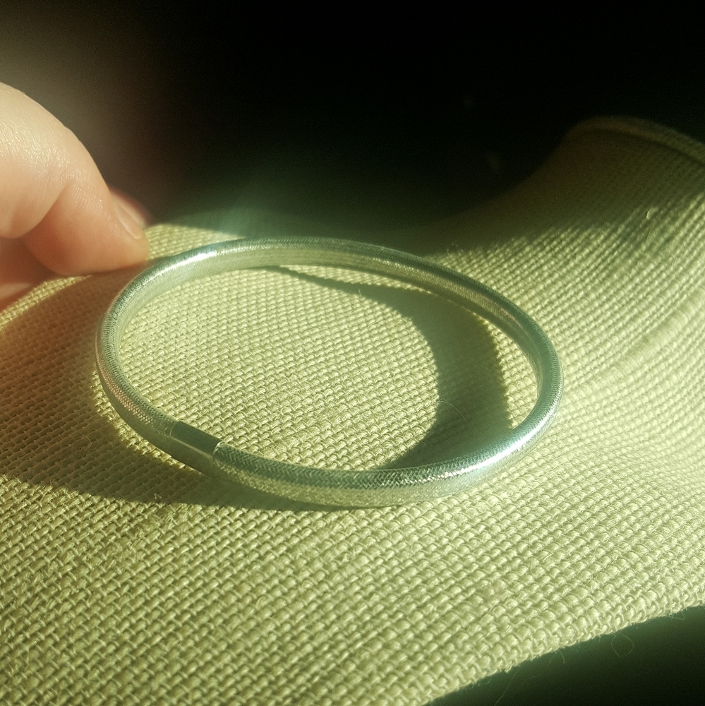 Ross & Simon 14kt gold mesh over silicone braclet
